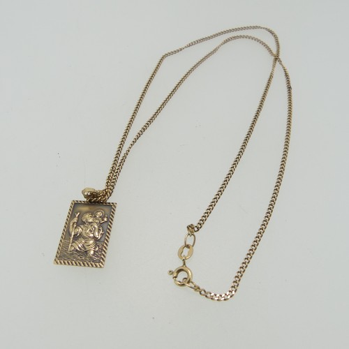 87 - A 9ct gold St. Christopher Pendant, 2cm long, on a fine 9ct gold curb link chain, 50cm long, total w... 