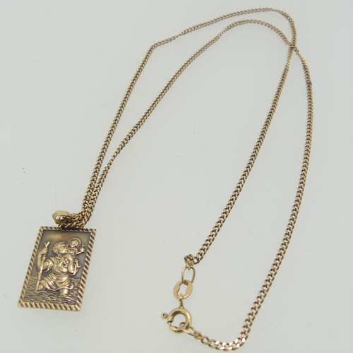 87 - A 9ct gold St. Christopher Pendant, 2cm long, on a fine 9ct gold curb link chain, 50cm long, total w... 