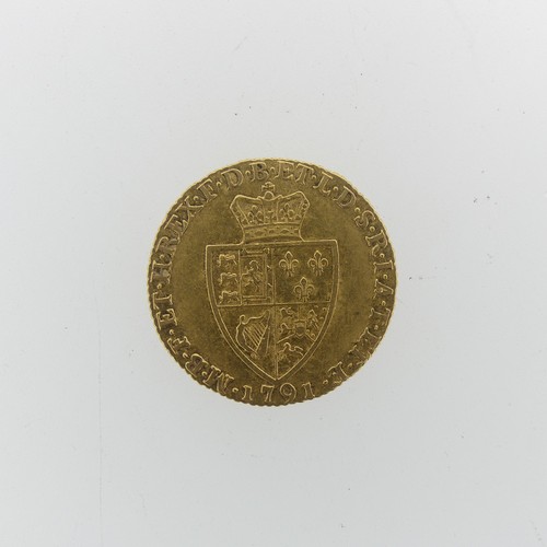 254 - A George III gold Guinea, dated 1791, with spade reverse.