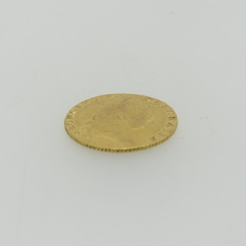 254 - A George III gold Guinea, dated 1791, with spade reverse.