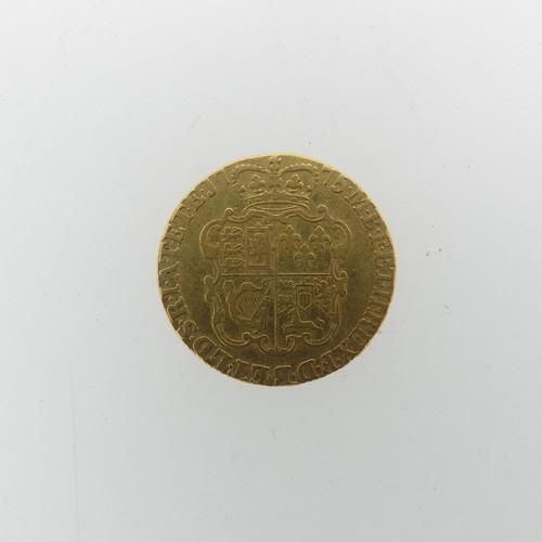 255 - A George III gold Guinea, dated 1775.