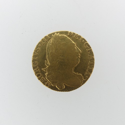 255 - A George III gold Guinea, dated 1775.