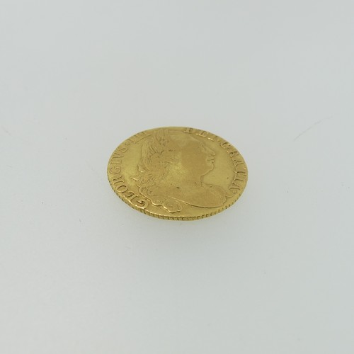 255 - A George III gold Guinea, dated 1775.