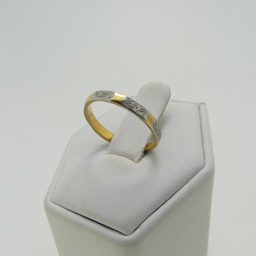 62 - A narrow 22ct yellow gold Band, with white gold engraved detailing, Size J, 1.9g, together with a sm... 