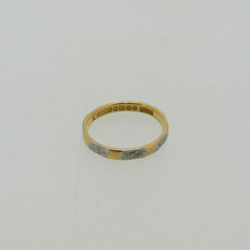 62 - A narrow 22ct yellow gold Band, with white gold engraved detailing, Size J, 1.9g, together with a sm... 