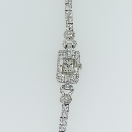 197 - A lady's Art Deco diamond Cocktail Watch, c.1930, the unsigned rectangular dial with Arabic Numerals... 