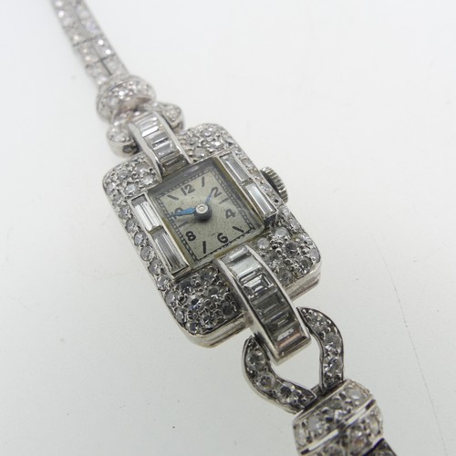 197 - A lady's Art Deco diamond Cocktail Watch, c.1930, the unsigned rectangular dial with Arabic Numerals... 