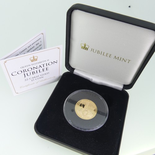 221 - A Gibraltar gold £1 (one pound) Coin, dated 2013, commemorative edition marking the coronations of Q... 