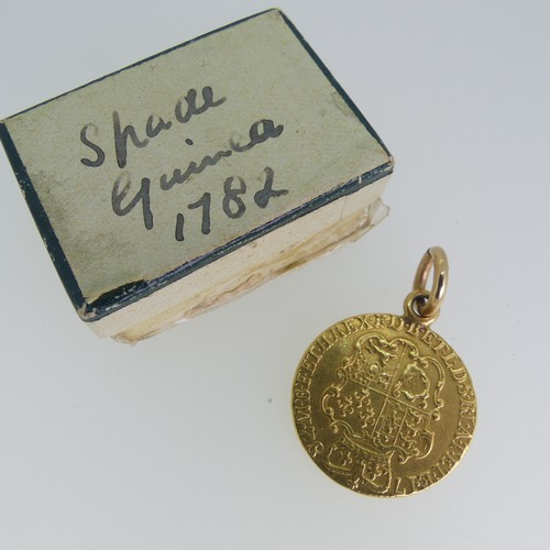 229 - A George III gold Guinea, dated 1782, fourth head, with soldered suspension ring.