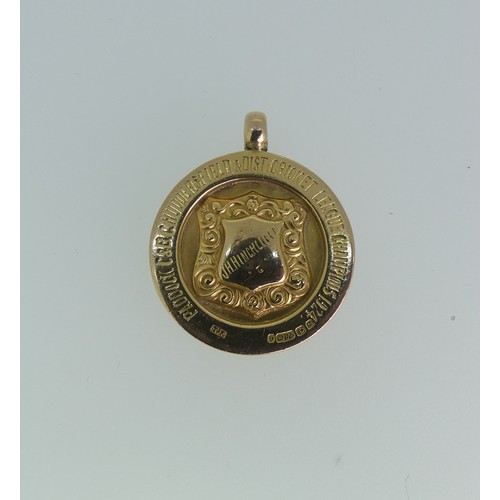 231 - A 9ct gold prize Fob Medallion, with presentation inscription 'Paddock C&B.C Huddersfield & ... 