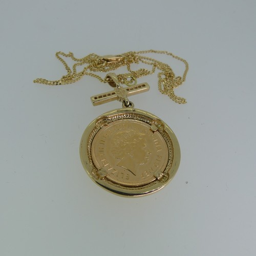 239 - An Elizabeth II gold Half Sovereign, dated 2004, in 9ct gold pendant mount with diamond set suspensi... 