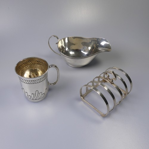 339 - A Victorian silver Christening Mug, by George Unite & Sons, hallmarked London, 1889, with fluted... 