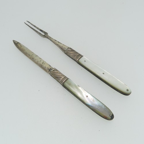 359 - An early 19thC silver folding Fruit Fork, with mother of pearl handle and bright cut decoration, ini... 