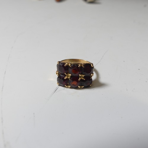 184 - Two 9ct gold rings set garnets, together with a silver tank cased wristwatch by Avantino with leathe... 