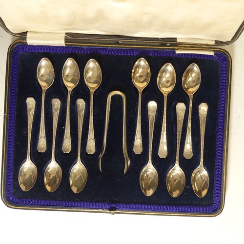 335 - A cased set of twelve George V silver Teaspoons with Sugar Nips, by Lee & Wigfull, hallmarked Sh... 