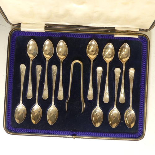 335 - A cased set of twelve George V silver Teaspoons with Sugar Nips, by Lee & Wigfull, hallmarked Sh... 