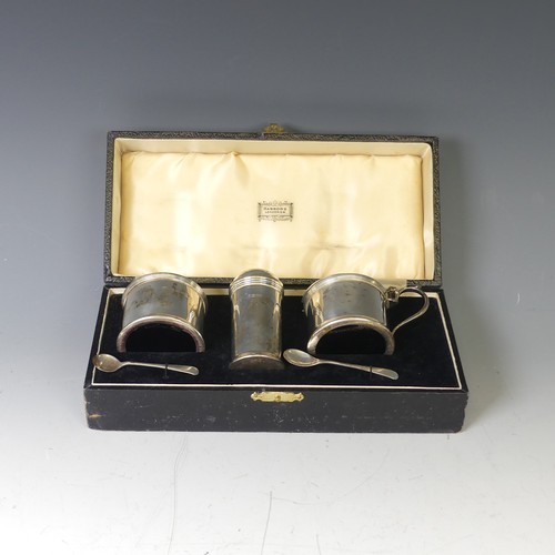 354 - A cased George V silver three piece Cruet Set, by Harrods Ltd., hallmarked London, 1934, of circular... 