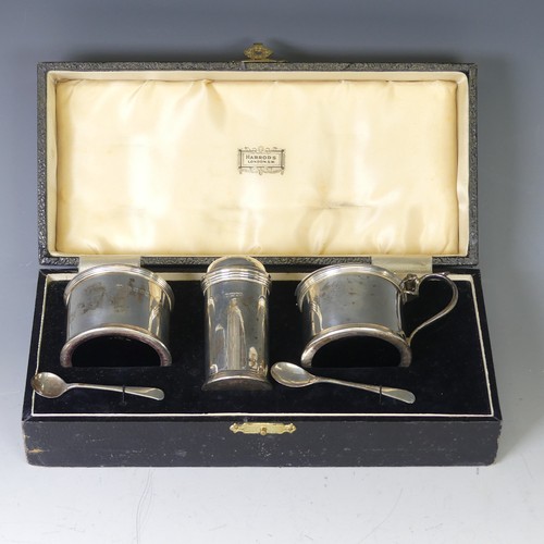 354 - A cased George V silver three piece Cruet Set, by Harrods Ltd., hallmarked London, 1934, of circular... 