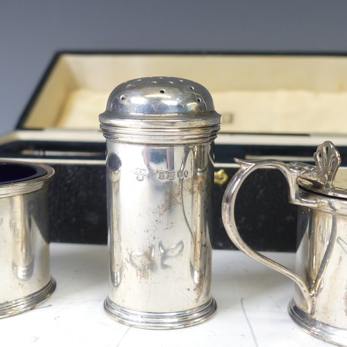 354 - A cased George V silver three piece Cruet Set, by Harrods Ltd., hallmarked London, 1934, of circular... 