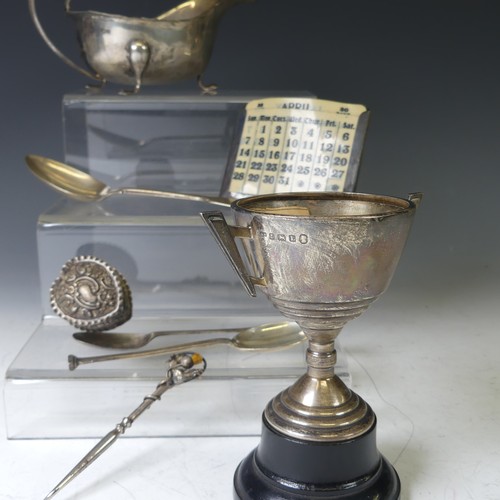 273 - A George V silver two handled Trophy Cup, hallmarked Birmingham 1935, in the Art Deco style, with la... 