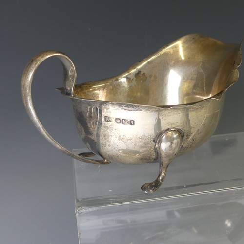 273 - A George V silver two handled Trophy Cup, hallmarked Birmingham 1935, in the Art Deco style, with la... 