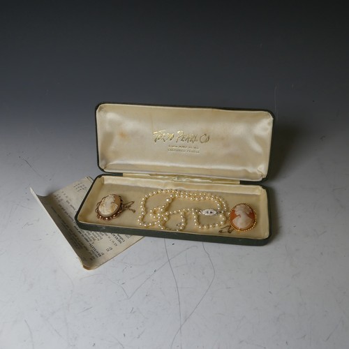 170A - Two 9ct gold mounted oval shell Cameo's, together with a string of graduated cultured pearls (3)... 