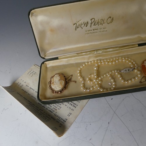 170A - Two 9ct gold mounted oval shell Cameo's, together with a string of graduated cultured pearls (3)... 