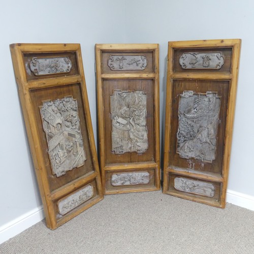 256 - A set of three carved classical Chinese Screens/Window Shutters, one side with detailed carvings of ... 