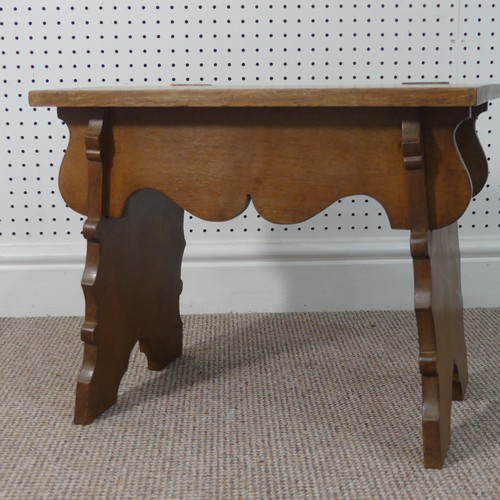 257 - An Arts and Crafts oak stool by Waring and Gillow, with hinged seat, Waring and Gillow Lancashire fa... 