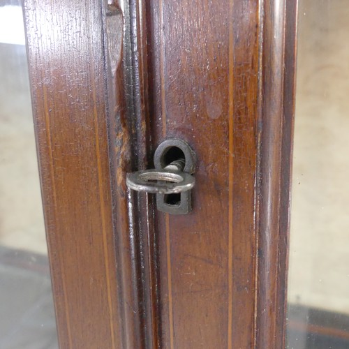 258 - An Edwardian mahogany display cabinet, with inlaid decoration, having three shelves enclosed by two ... 