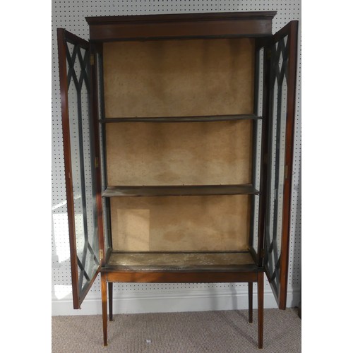 258 - An Edwardian mahogany display cabinet, with inlaid decoration, having three shelves enclosed by two ... 