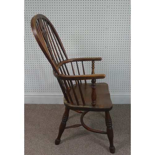 259 - A Late Victorian ash and elm Windsor Chair, stick-back with pierced splat above solid carved base up... 