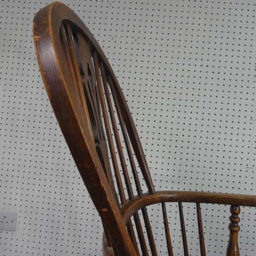 259 - A Late Victorian ash and elm Windsor Chair, stick-back with pierced splat above solid carved base up... 