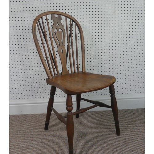 259 - A Late Victorian ash and elm Windsor Chair, stick-back with pierced splat above solid carved base up... 