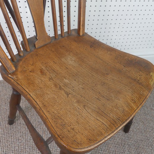 259 - A Late Victorian ash and elm Windsor Chair, stick-back with pierced splat above solid carved base up... 