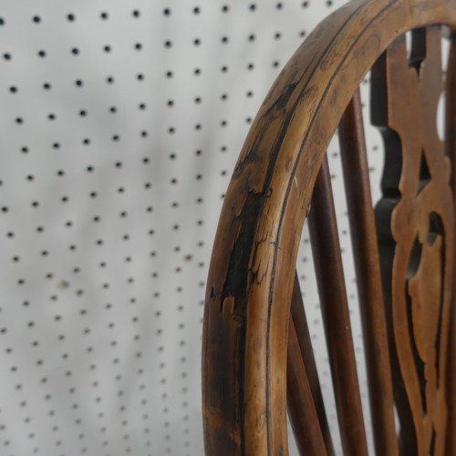 259 - A Late Victorian ash and elm Windsor Chair, stick-back with pierced splat above solid carved base up... 