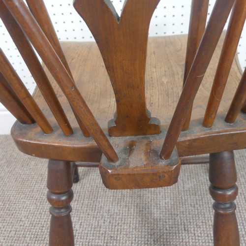 259 - A Late Victorian ash and elm Windsor Chair, stick-back with pierced splat above solid carved base up... 