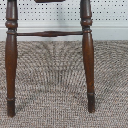 259 - A Late Victorian ash and elm Windsor Chair, stick-back with pierced splat above solid carved base up... 