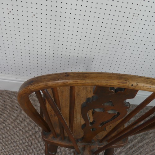 259 - A Late Victorian ash and elm Windsor Chair, stick-back with pierced splat above solid carved base up... 