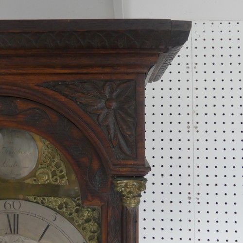 217 - W. Fletcher, Leeds, a carved oak 8-day longcase clock with two-weight movement striking on a bell, t... 