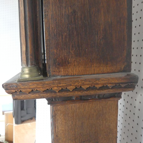 217 - W. Fletcher, Leeds, a carved oak 8-day longcase clock with two-weight movement striking on a bell, t... 