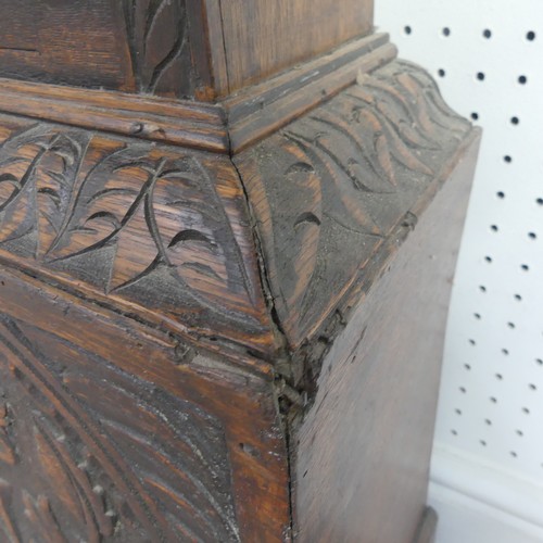 217 - W. Fletcher, Leeds, a carved oak 8-day longcase clock with two-weight movement striking on a bell, t... 