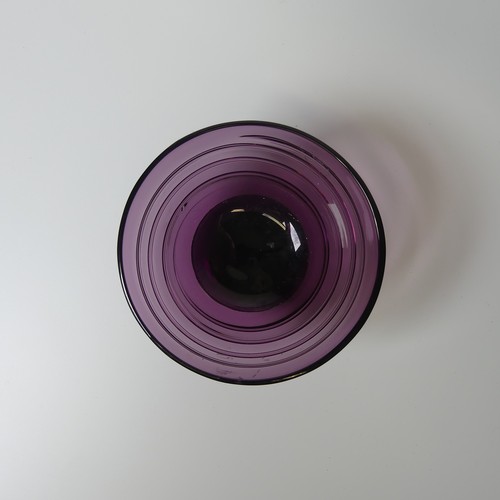 27 - A Barnaby Powell for Whitefriars ribbon-trail footed Bowl, in aubergine purple, D 12cm x H 7.5cm, to... 