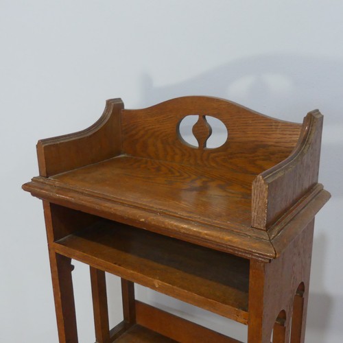 248 - A late 19th century oak Arts & Crafts inspired open Bookcase, with four fixed shelves an open ba... 