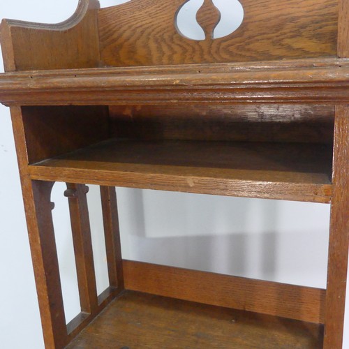 248 - A late 19th century oak Arts & Crafts inspired open Bookcase, with four fixed shelves an open ba... 