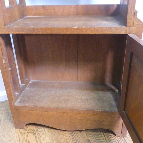 248 - A late 19th century oak Arts & Crafts inspired open Bookcase, with four fixed shelves an open ba... 