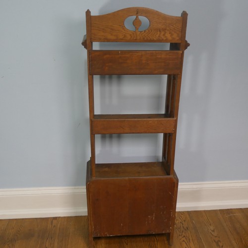 248 - A late 19th century oak Arts & Crafts inspired open Bookcase, with four fixed shelves an open ba... 