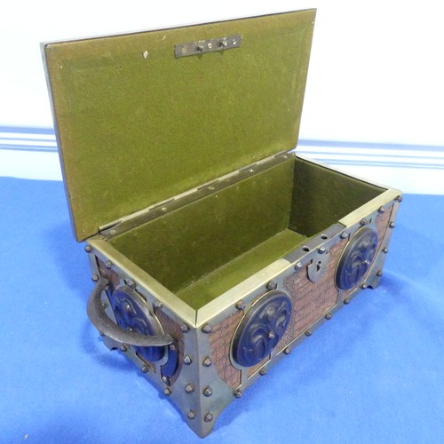 269 - A brass and leatherette Arts and crafts jewelry box, with decorative metal motives and studs, W 31 c... 