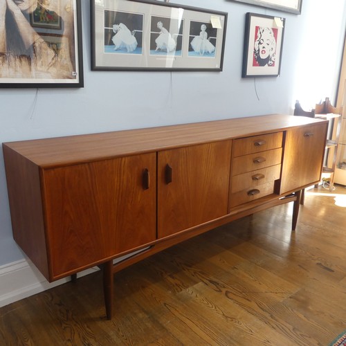 272 - A 1960s retro G-Plan Teak              'Brasilia' Sideboard, in the Danish style, with four central ... 