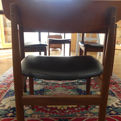 273 - A 1960s G-Plan draw leaf 'Brasilia' teak Dining Table, together with a set of four chairs upholstere... 